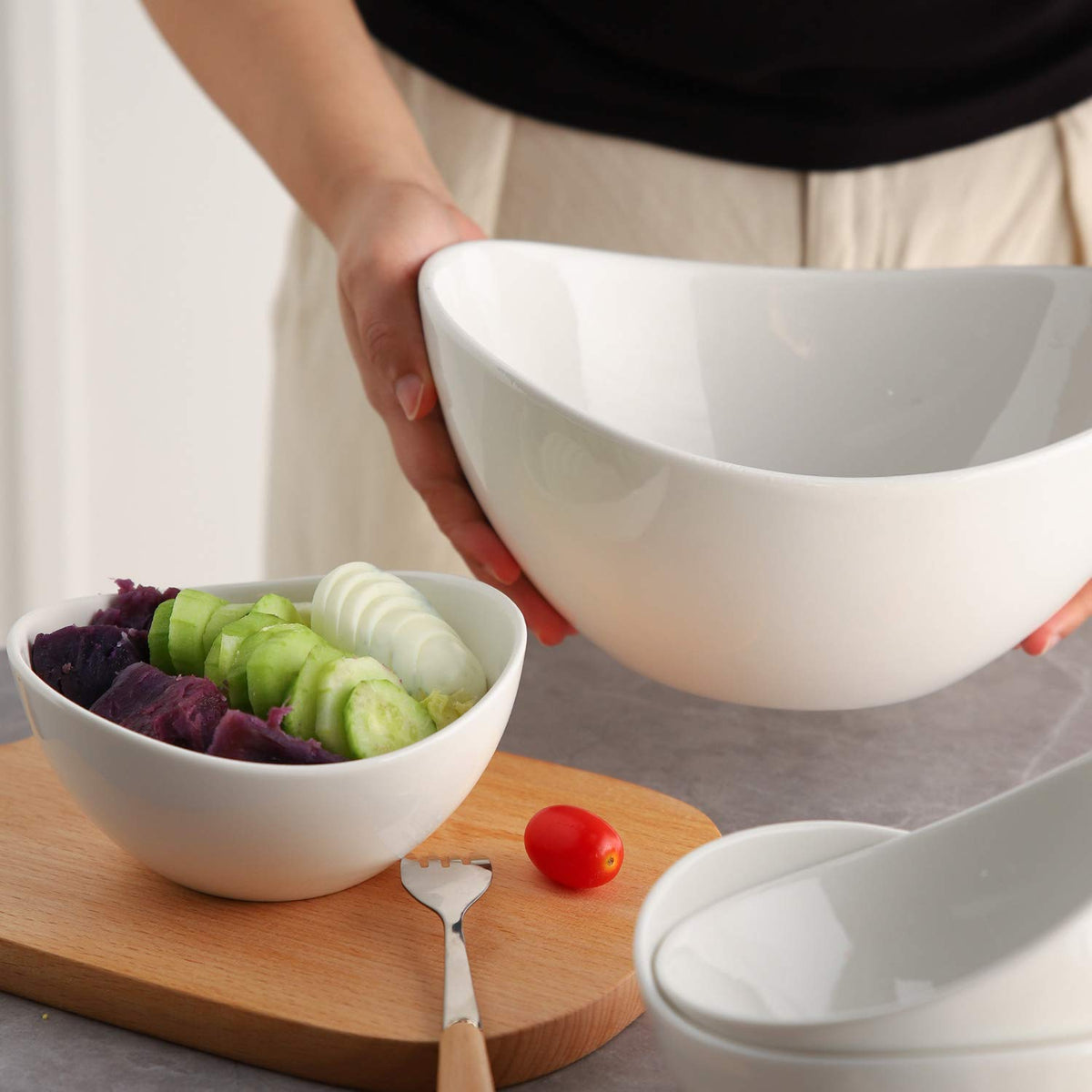 Samsle white-gloss porcelain bowls add a clean table vibe.