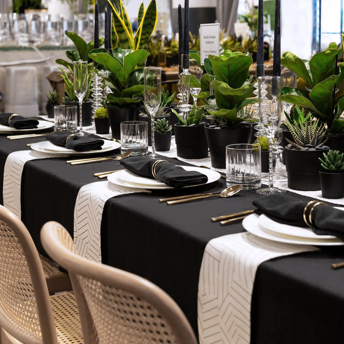 Sancua black tablecloth on outdoor picnic setup for versatile use.