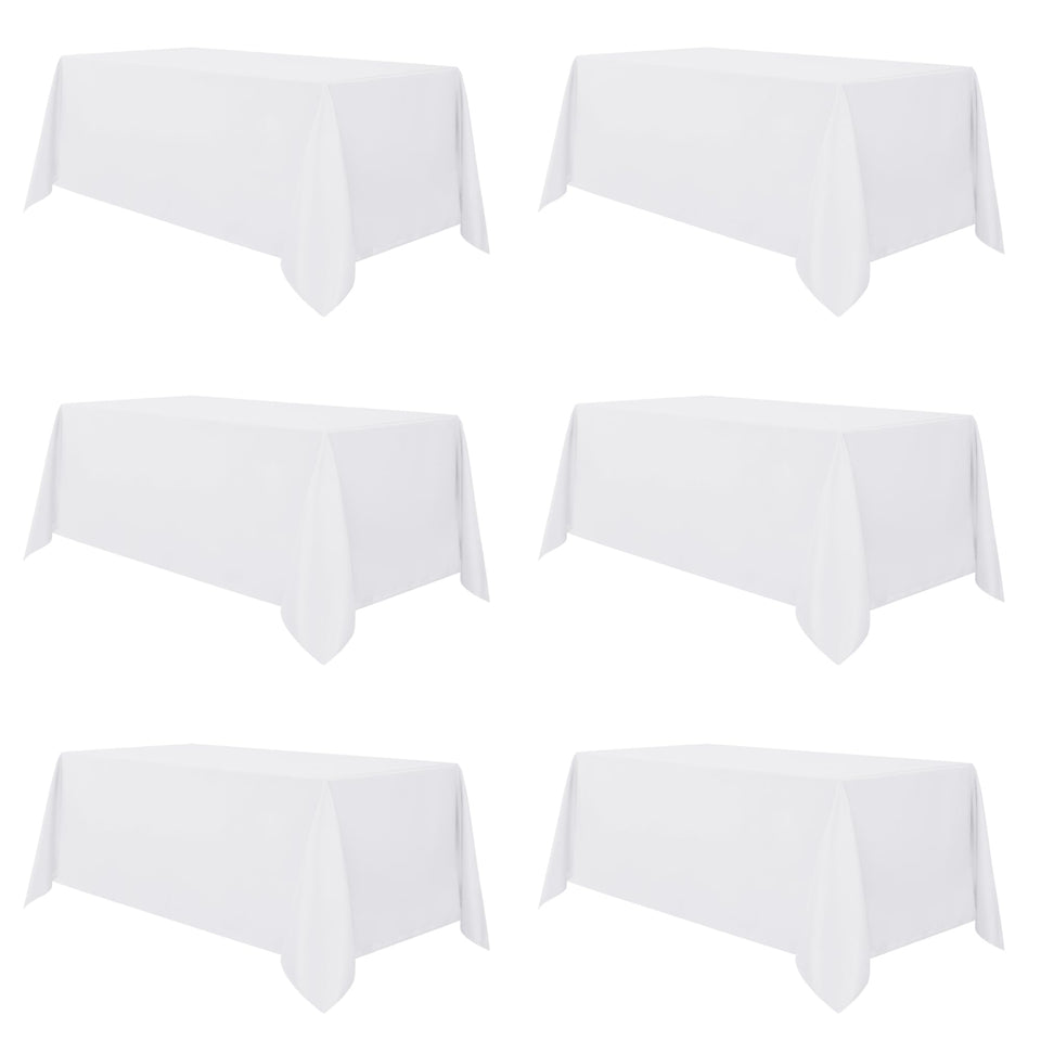 Sancua 6-pack white tablecloth on an 8ft table for elegant dining and easy cleanup.