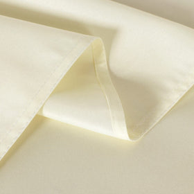 Sancua beige tablecloth wrinkle-resistant fabric drapes cleanly over a table