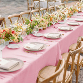 Sancua pink tablecloth spread with clean lines and smooth drape.