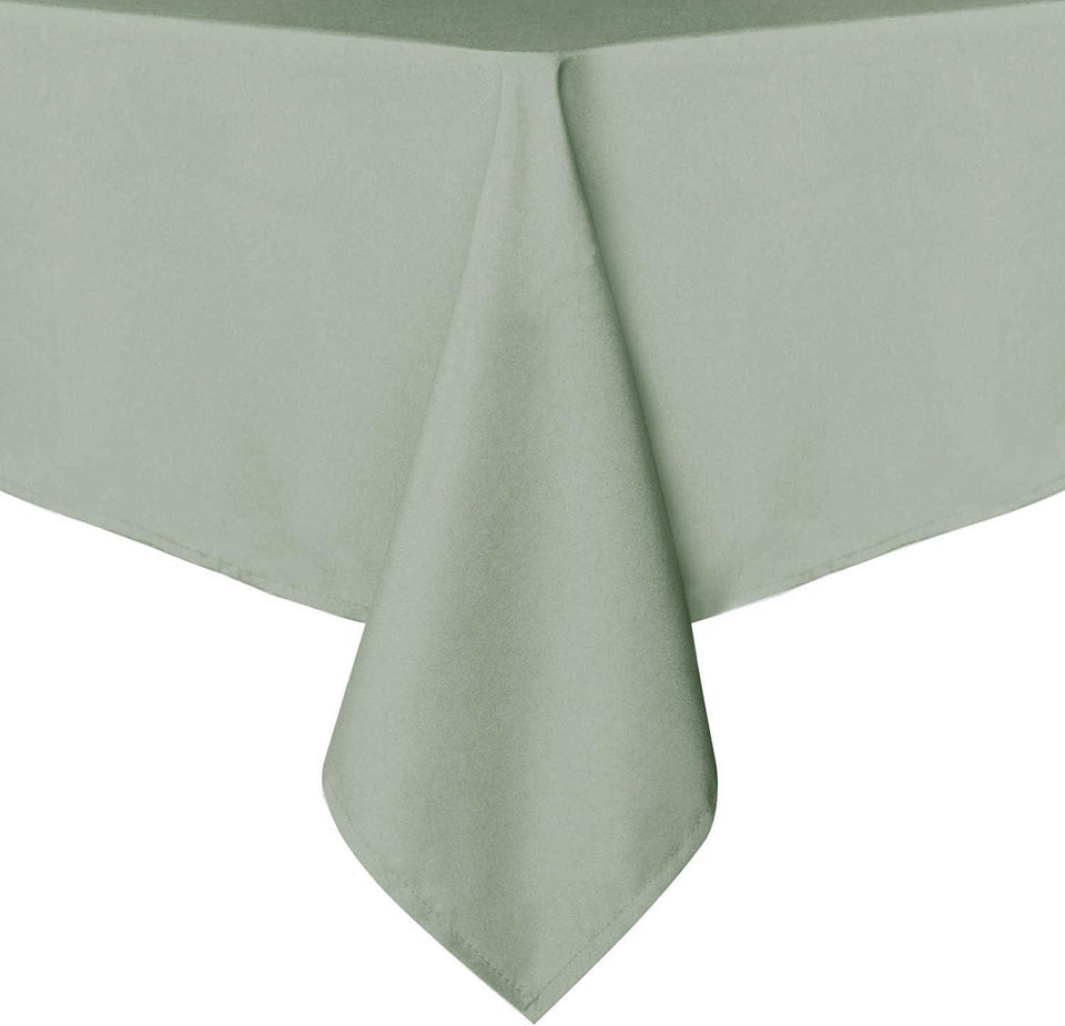 Sancua rectangle tablecloth on table in sage green for elegant dining.