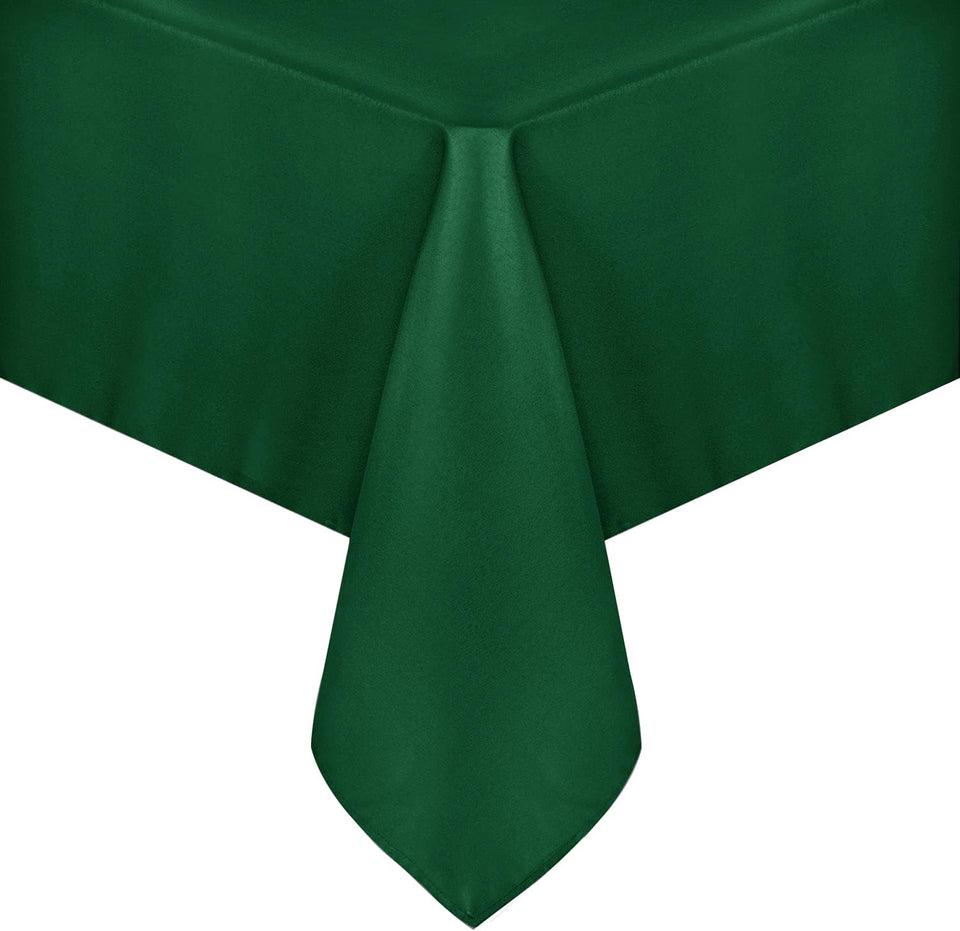 Sancua hunter green rectangle tablecloth on 60x84 inch dining setup, surface protected.