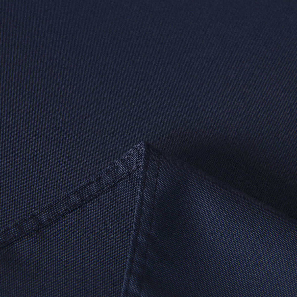 Sancua rectangle tablecloth on buffet setup highlights stain resistance.