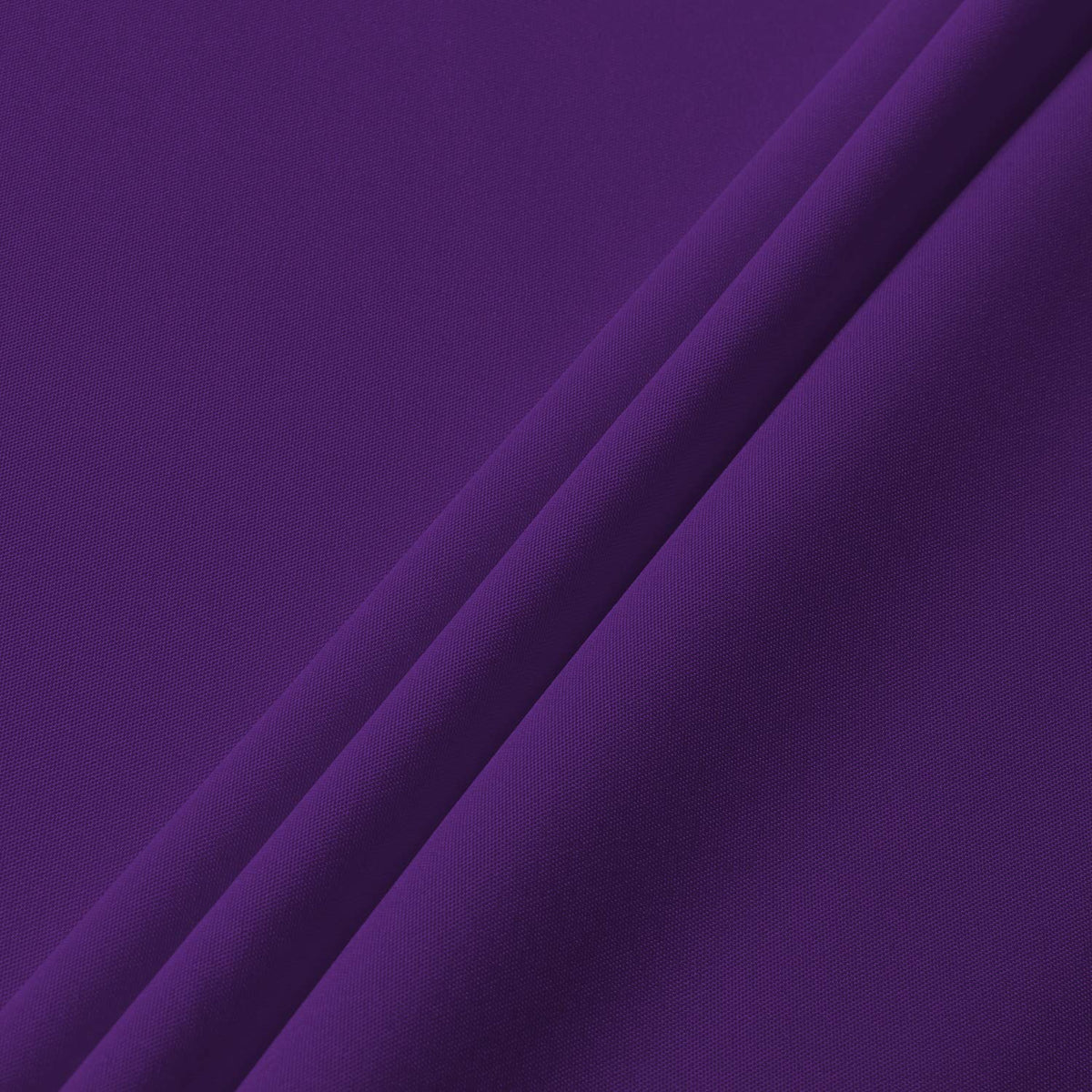 Sancua outdoor camping setup with purple tablecloth on a tabletop.