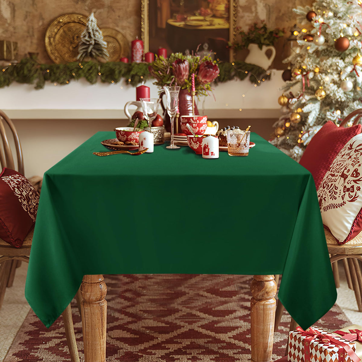 Sancua hunter green dining scene, adds elegant ambience to table setting.