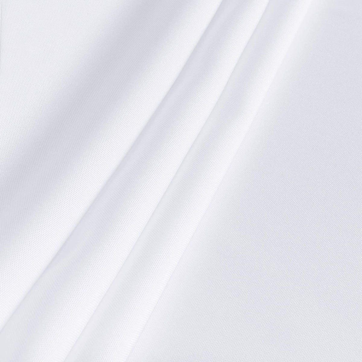 Sancua close-up of wrinkle-free finish on a white tablecloth