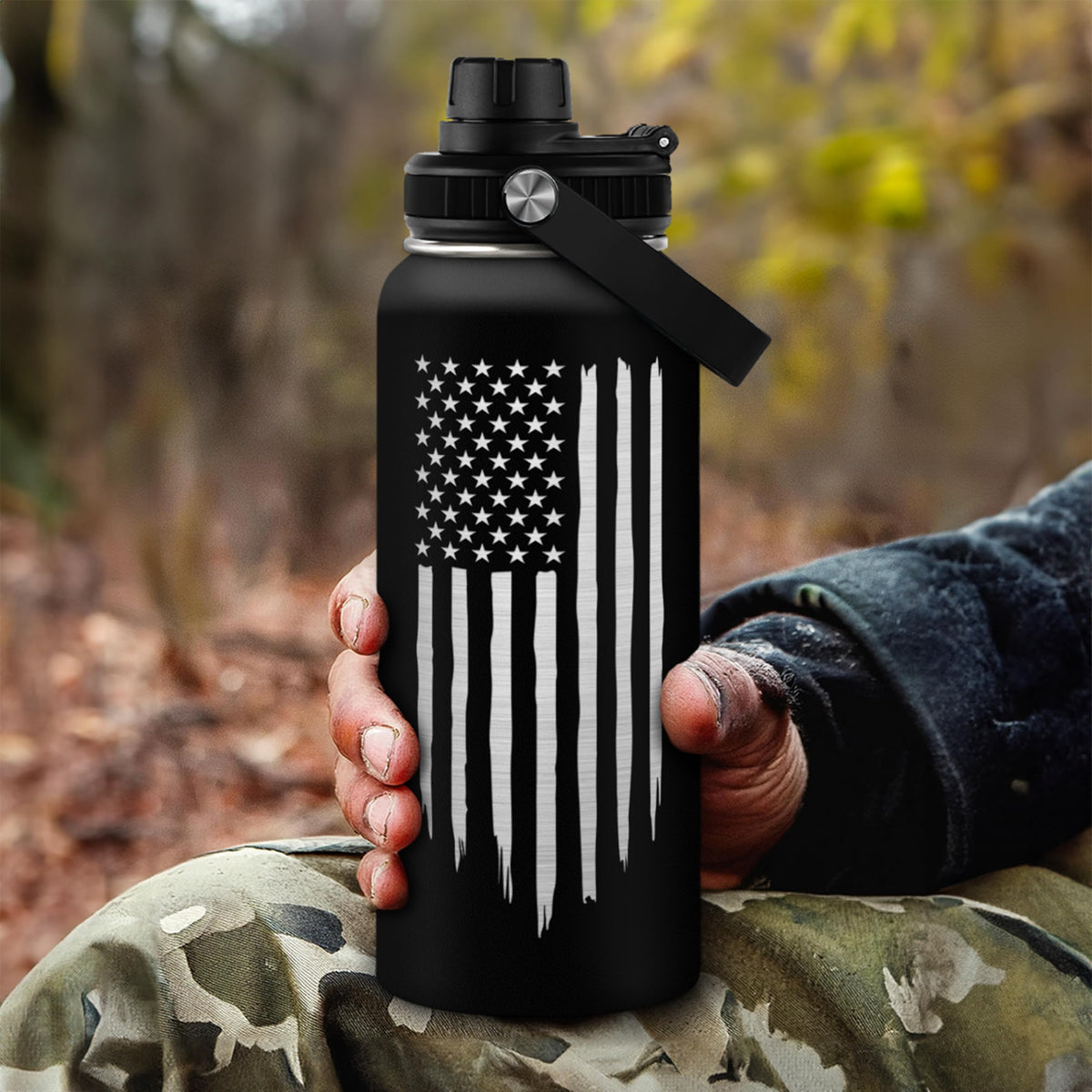 SANDJEST American Flag 32oz bottle in a backpack or gym bag.