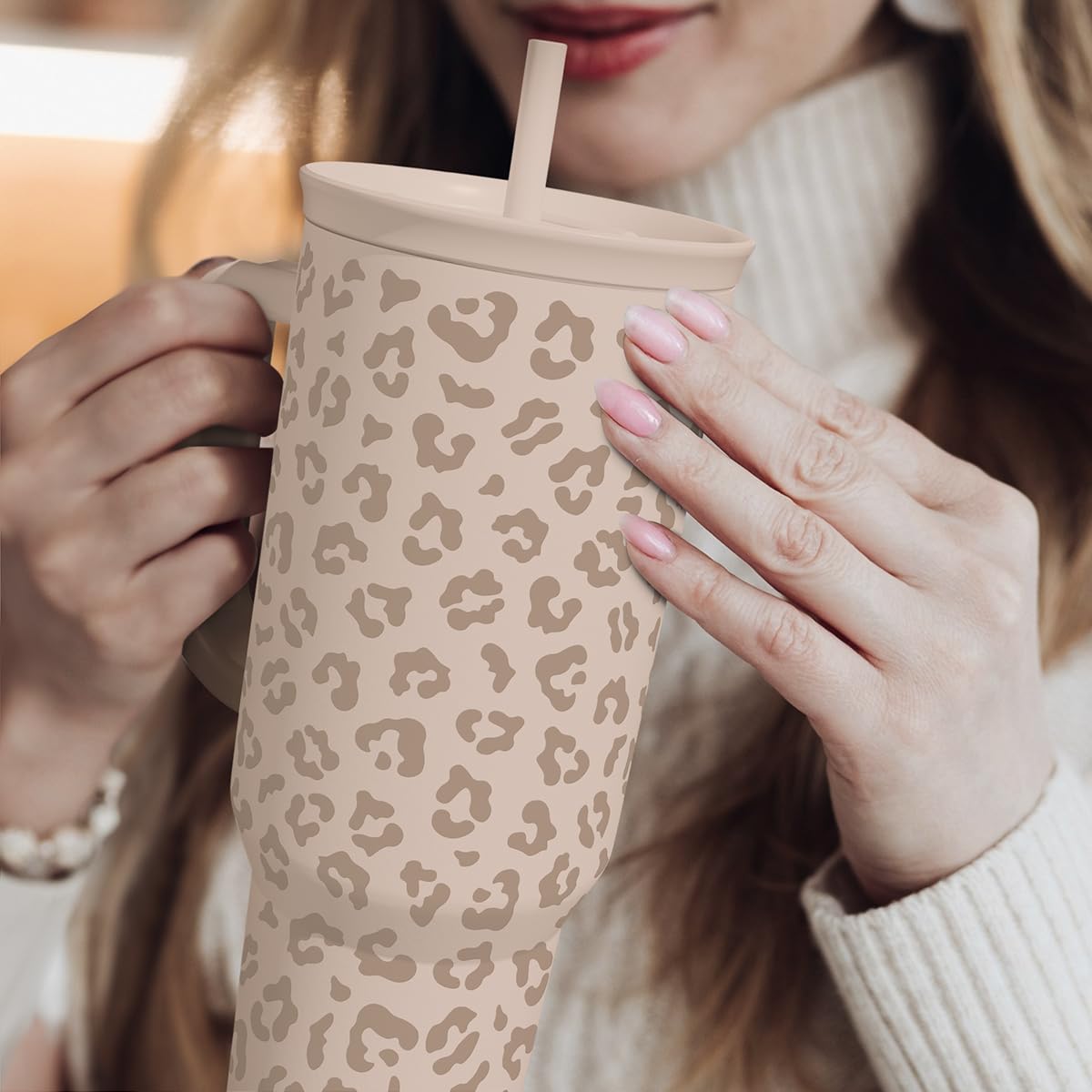 SANDJEST Leopard Tumbler in use during gym or travel