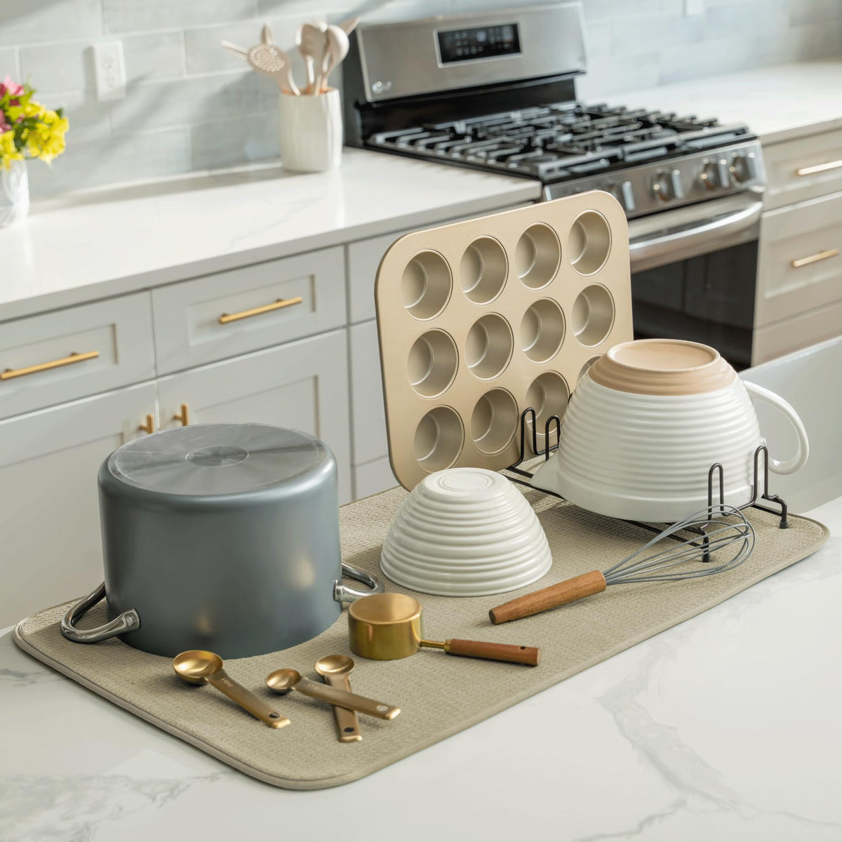 S&T INC. Absorbent microfiber counter mat in use protects delicate glassware.