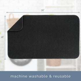 S&T INC. oversized microfiber mat catches drips from pots and pans.