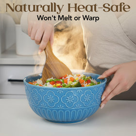 SANJH teak cooking spoon with smooth handle for comfortable stirring.