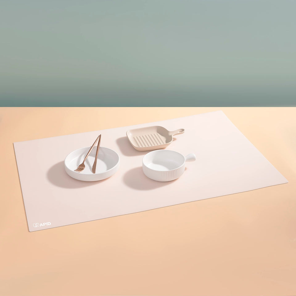 Sapid silicone mat 36x24 countertop protector guards against spills and heat.