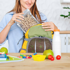 Saviki bag stands upright on reinforced bottom for organized storage.