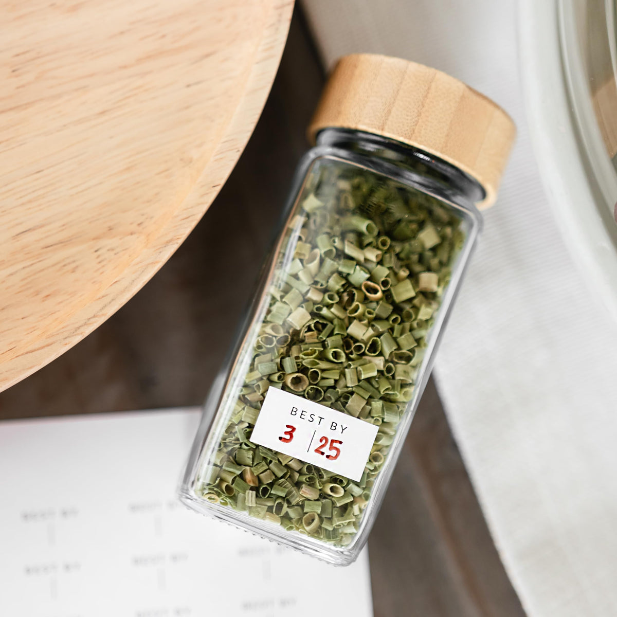Elegant kitchen setup showing comprehensive spice organization with SAVVY & SORTED