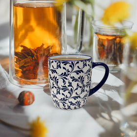 Large porcelain mug with smooth glaze and solid weight for everyday use.