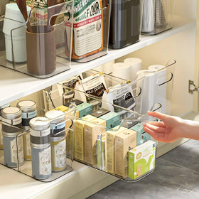 SCPB clear bin in a kitchen cabinet, providing quick visibility.