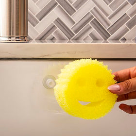 Scrub Daddy holder's open design allows quick drainage after use