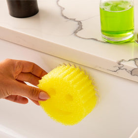 Open-air design promotes faster drainage and drying of Scrub Daddy sponges