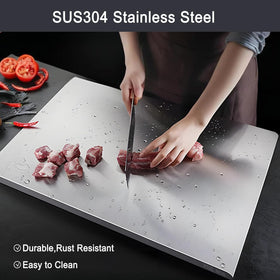 Scyllantric double-sided cutting board, meat-side and produce-side for hygiene and organization.