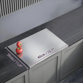 Scyllantric 304 cutting board with folded edge base, stable surface for safe chopping.