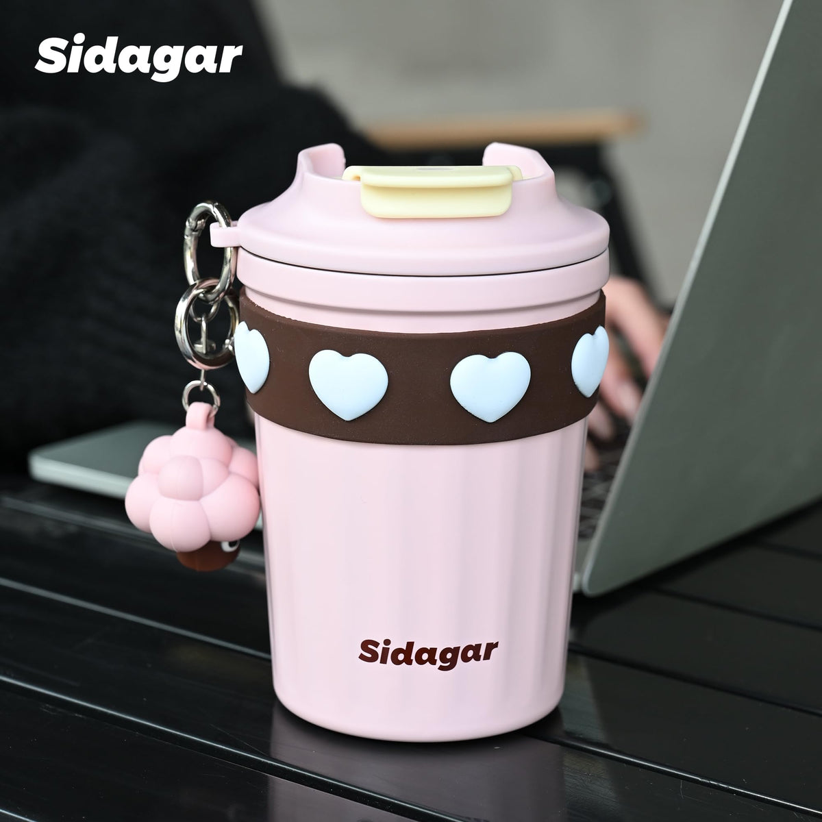SDGA+ light pink travel mug blends style with practicality for women on the move.
