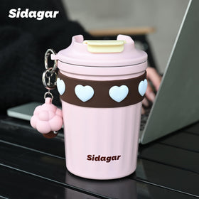 SDGA+ light pink travel mug blends style with practicality for women on the move.