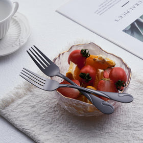 Seeshine black flatware salad and dessert forks for elegant courses and parties.