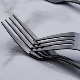 Seeshine black silverware set showcases mirror finish and vacuum plating technology.