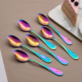 Seeshine rainbow tea spoons arranged with a cup for a stylish table setting.