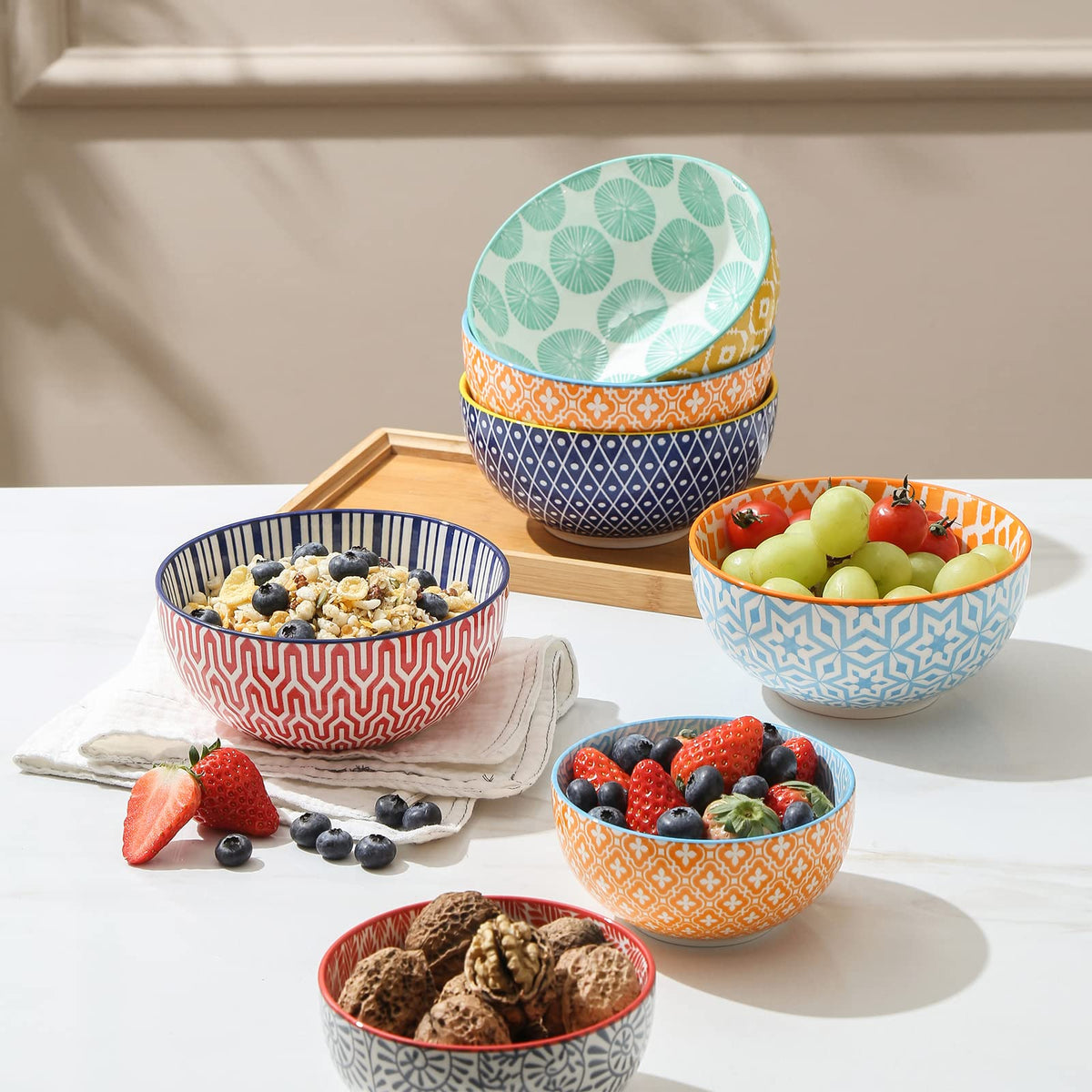 Selamica bowls with colorful patterns inside and outside for vibrant table decor