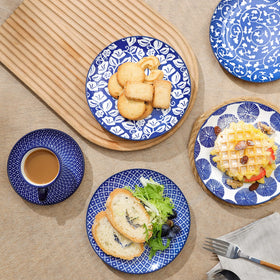Selamica plate with raised edges to help contain sauces