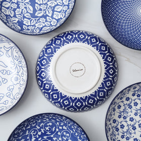 Selamica stylish bowls on a table setting for pasta and salads.