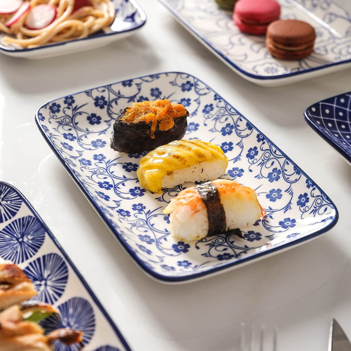 Selamica rectangular plates stacked neatly for compact serving