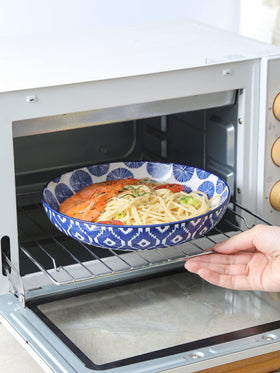 Selamica stackable glazed bowls save kitchen storage space.