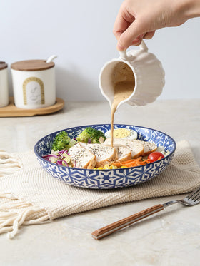 Selamica porcelain bowls with inside-out vintage blue design for elegant dining.