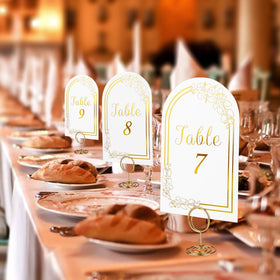 SELANTAG gold hot-foil stamped numbers catch light, elevating table décor with subtle shimmer.