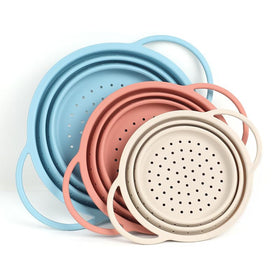 SELECTSHEN Silicone Colander Set folds for easy storage while draining pasta.