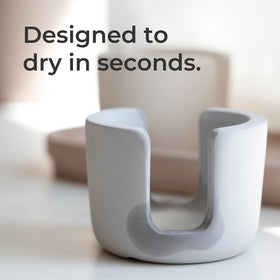 Selegna diatomite stone sponge caddy, top-down view, integrated design suits farmhouse or modern kitchens.