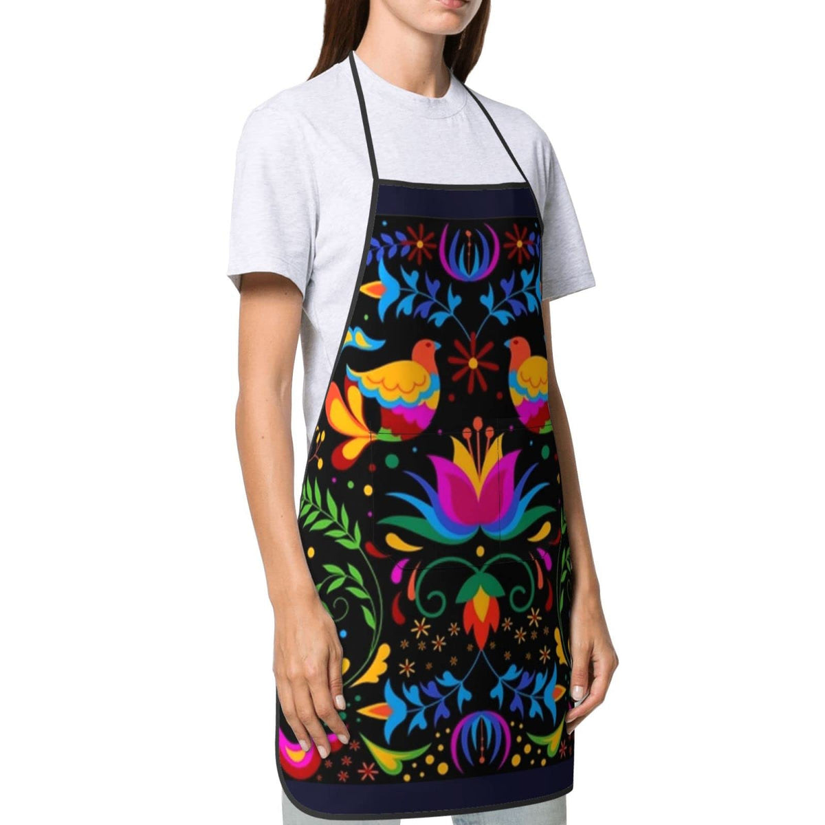 Senheol Dia de los Muertos apron side view illustrating adjustable ties for a comfortable fit.