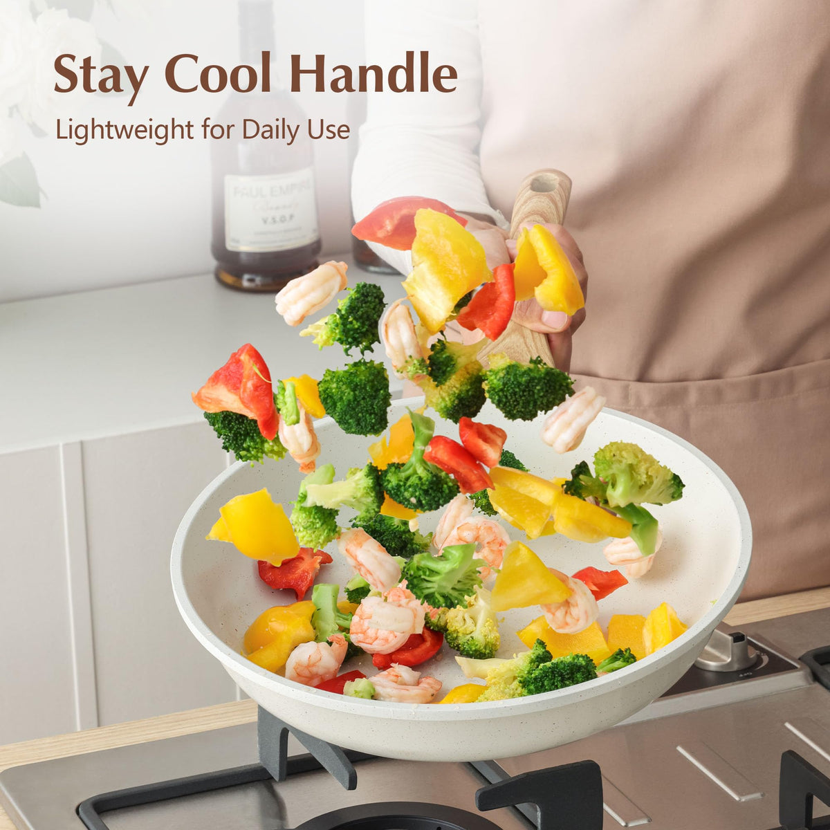 SENSARTE tempered glass lid helps monitor progress while reducing splatter.