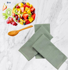Serafina Home sage green towels as decorative kitchen accents