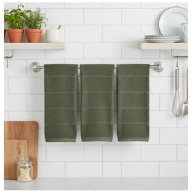 Serafina Home olive green towel with ribbed texture and loop for easy hanging.