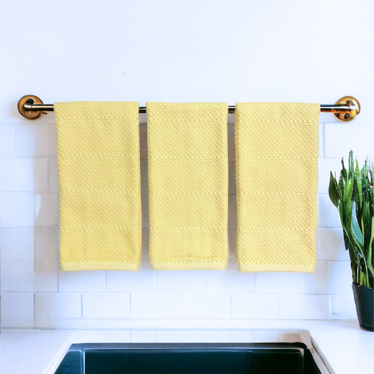 Pale yellow decorative kitchen towels by Serafina Home