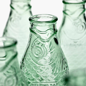 Close-up of Serax green glass carafe showing clarity