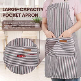 Serrenf kitchen apron protecting clothes from grease and spills during cooking.