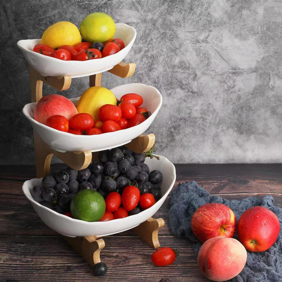 SEVEN SPARTA ceramic fruit bowl top tier on bamboo stand for space-saving countertop display.