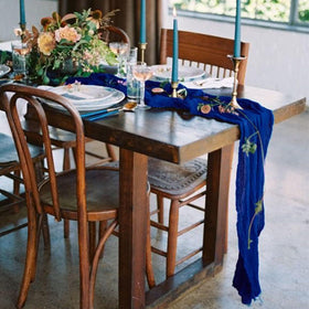 Seveups royal blue table runner close-up shows wrinkled gauze texture for an elegant look.