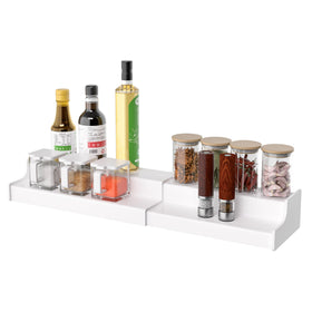 Sezanrpt 2 tier spice rack front view with organized jars and clear acrylic shine.