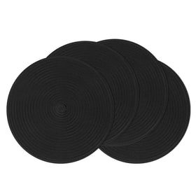 SHACOS round braided placemats in black add a refined dining touch while protecting surfaces.
